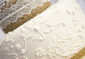 A close up of the detail of the icing on a cake
